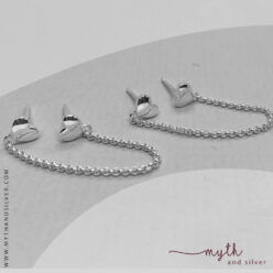 Silver double piercing earrings with heart design