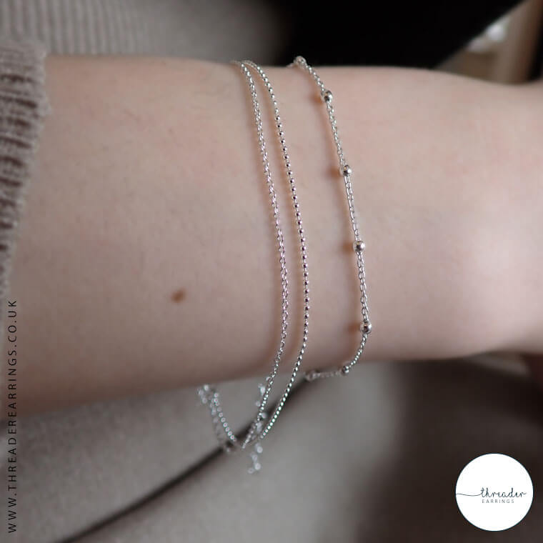 layered bracelets silver